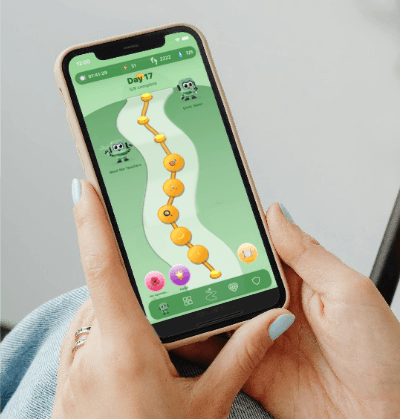 Man and woman walking along a bright pathway under blue skies with the Pocket Power app screenshot showing the Power Pathway feature, symbolising a guided journey to wellness